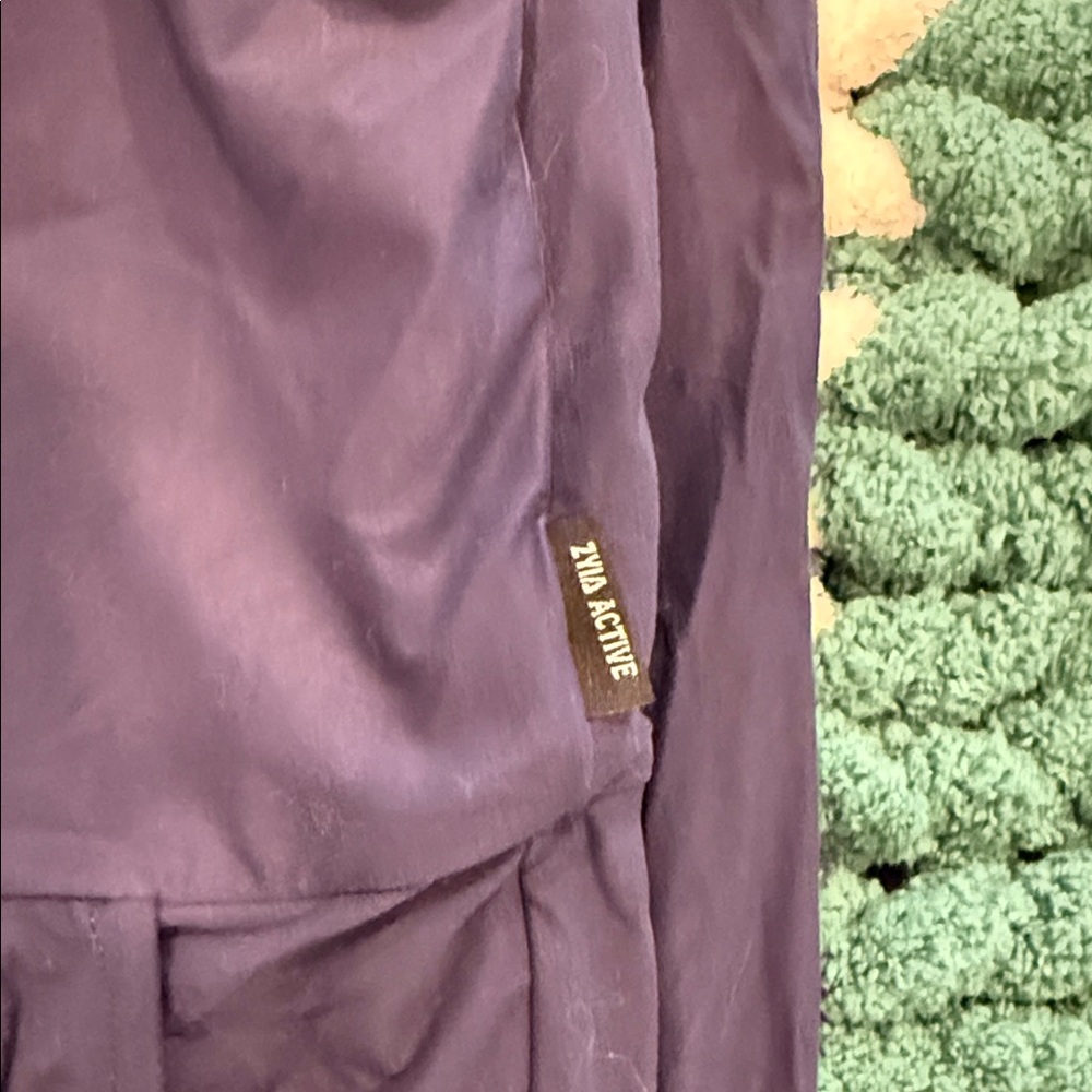 Set of Three Sleeveless Jumpsuits - Black, Light Blue, and Navy by Zyia. - Picture 6 of 9